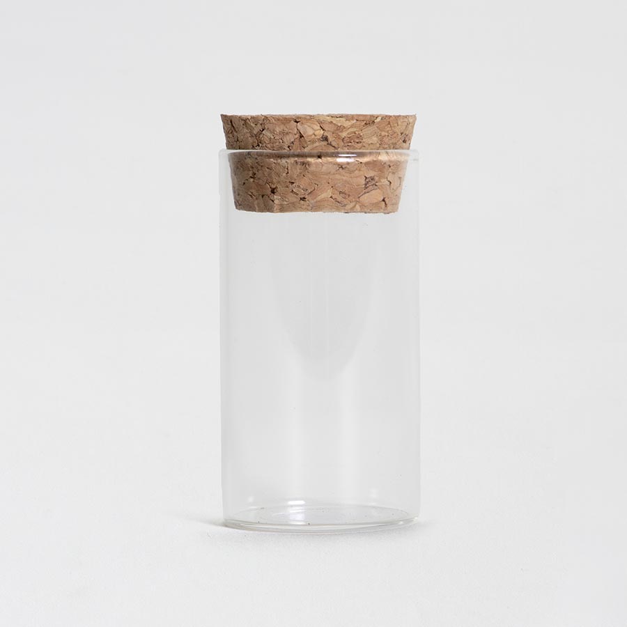 Kleines Glasgefäß mit Korkdeckel